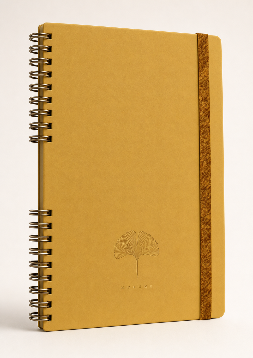 Mokume Mustard Yellow — amber-ochre soft-touch cover