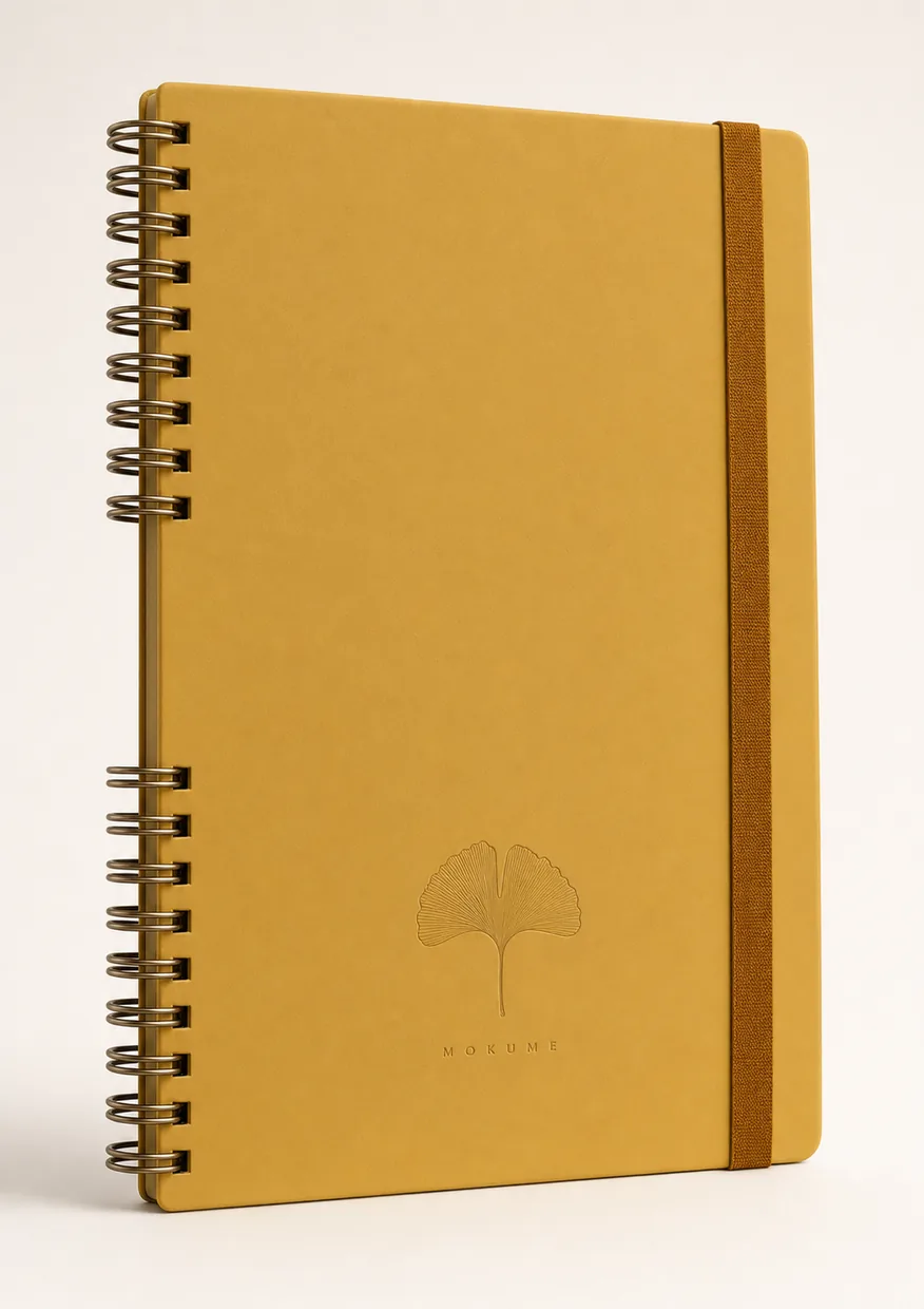Mokume Mustard Yellow — amber-ochre soft-touch cover